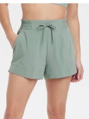 Women's Woven Mid Rise Athletic Shorts.
